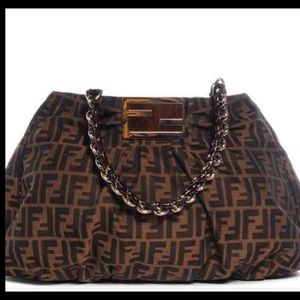 Pre own authentic Fendi Zucca bag